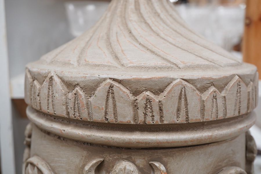 A pair of painted and carved wood lamps, 65cm to wood top